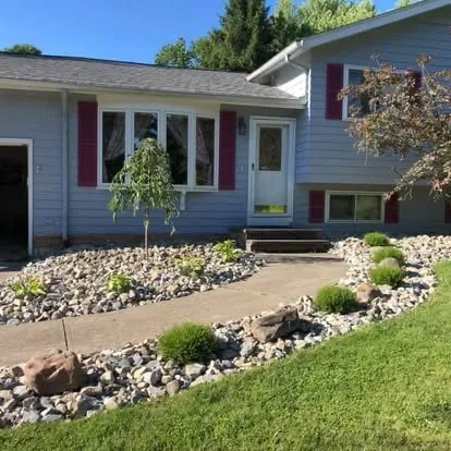 Full river rock front yard landscaping